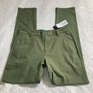 NWT Taylrd Golf commuter pants Olive men’s 32x34 / needs cleaned pen mark
